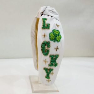 "Lucky" St. Patrick’s White Headband with Green Flower Accent